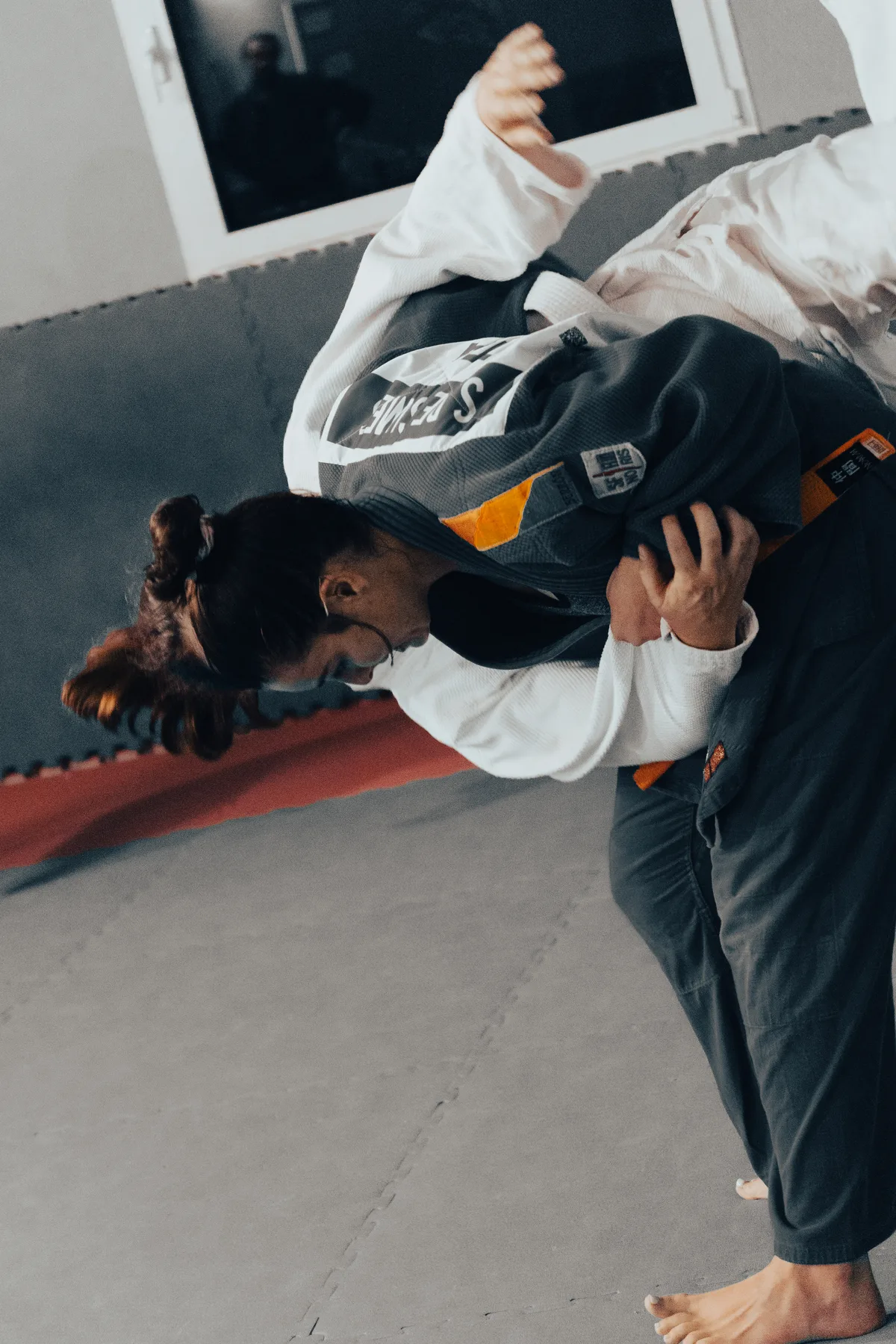 Allieva di Judo durante una proiezione in allenamento